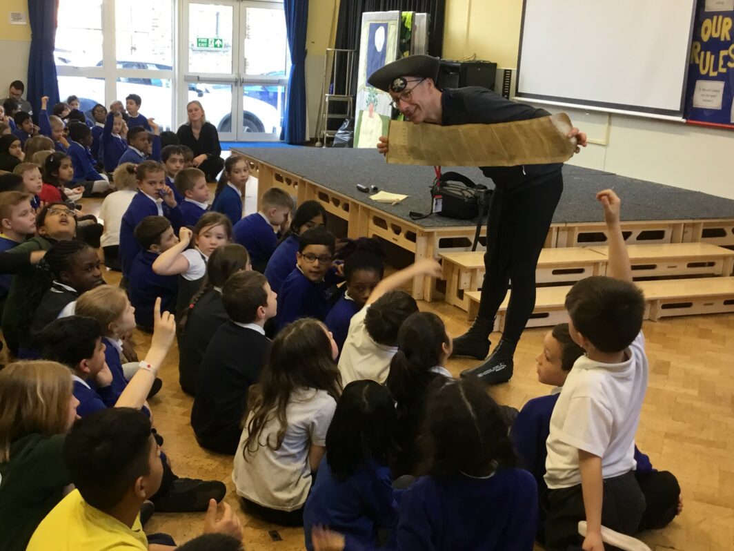 Rabbi Aaron Goldstein dressed as a pirate for Purim at a local primary school