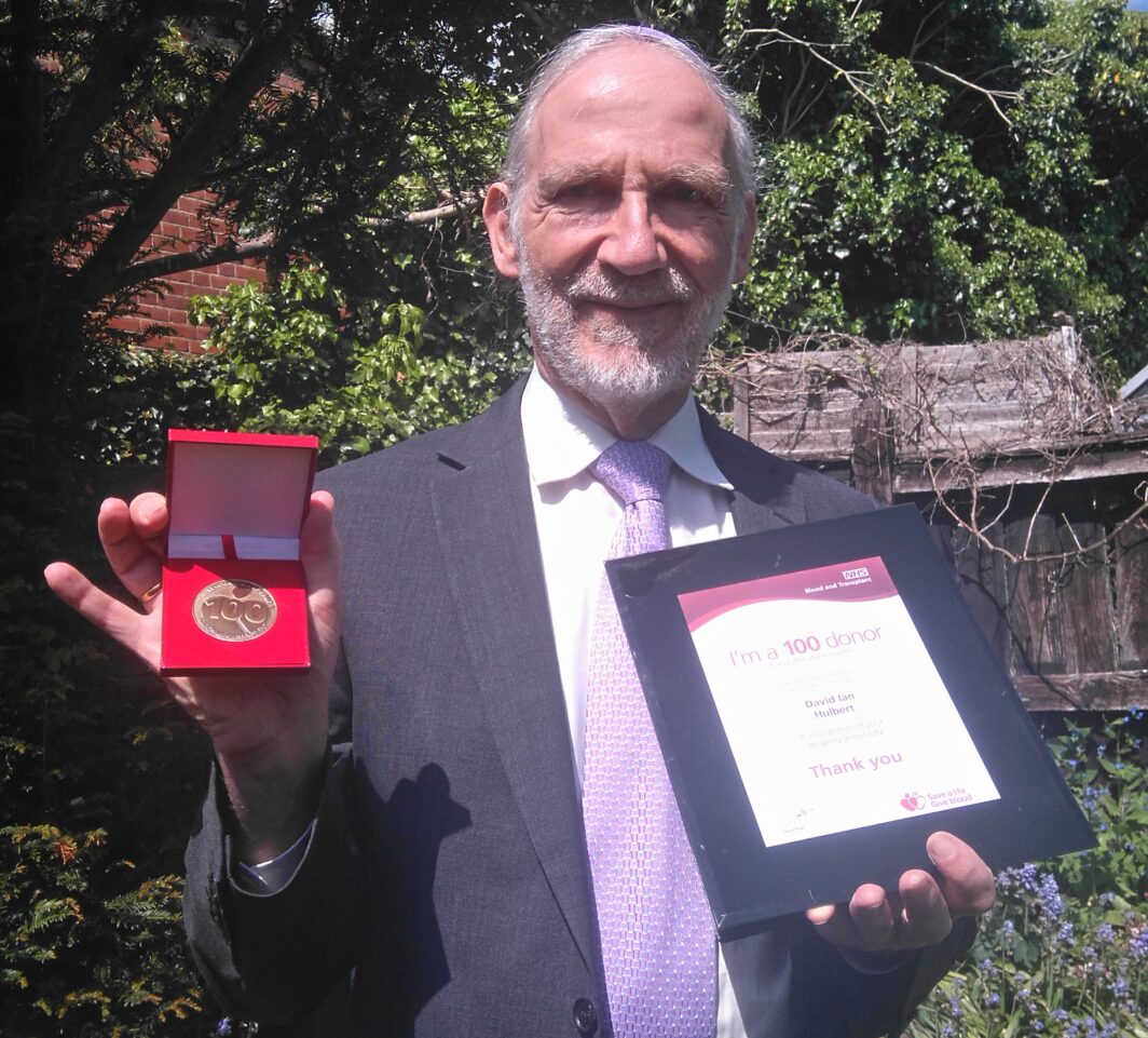 Rabbi David Hulbert with his award for more than 100 blood donations